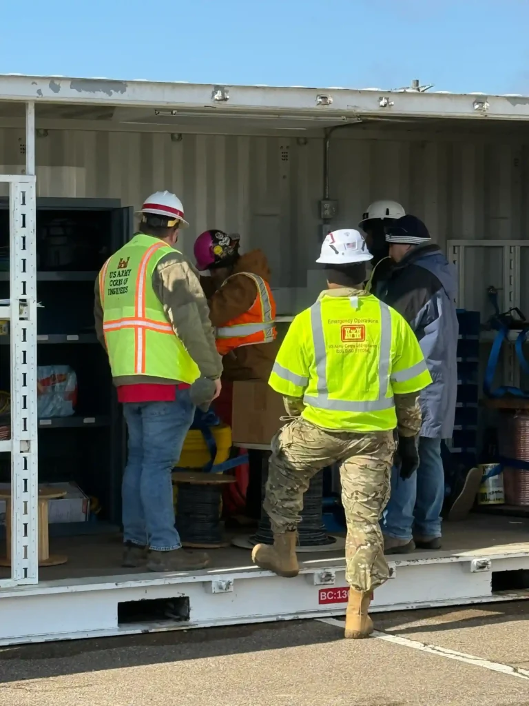Credentialed security personnel providing site access control at a federal emergency response facility